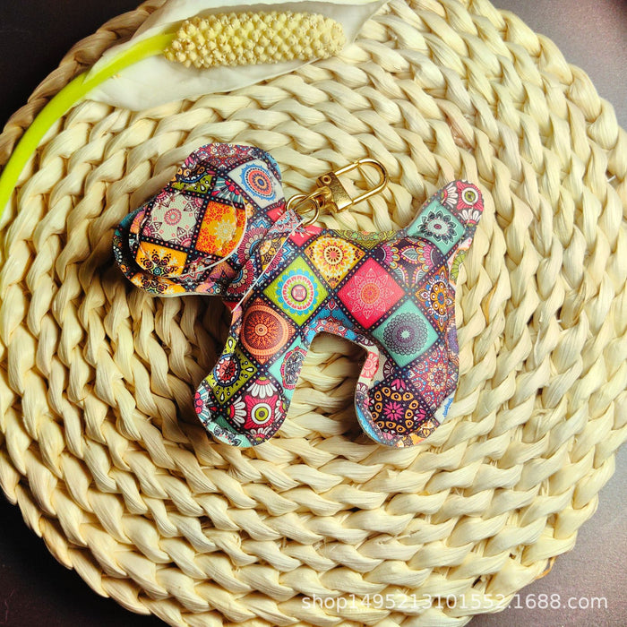 Wholesale Creative Keychain Printed Leather Women's Bag Pendant Exquisite Doll Creative Gift