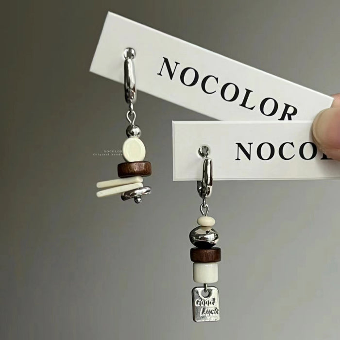 Wholesale Retro bead asymmetrical flower ear buckle design with a sense of niche temperament, simple and unique ear buckle