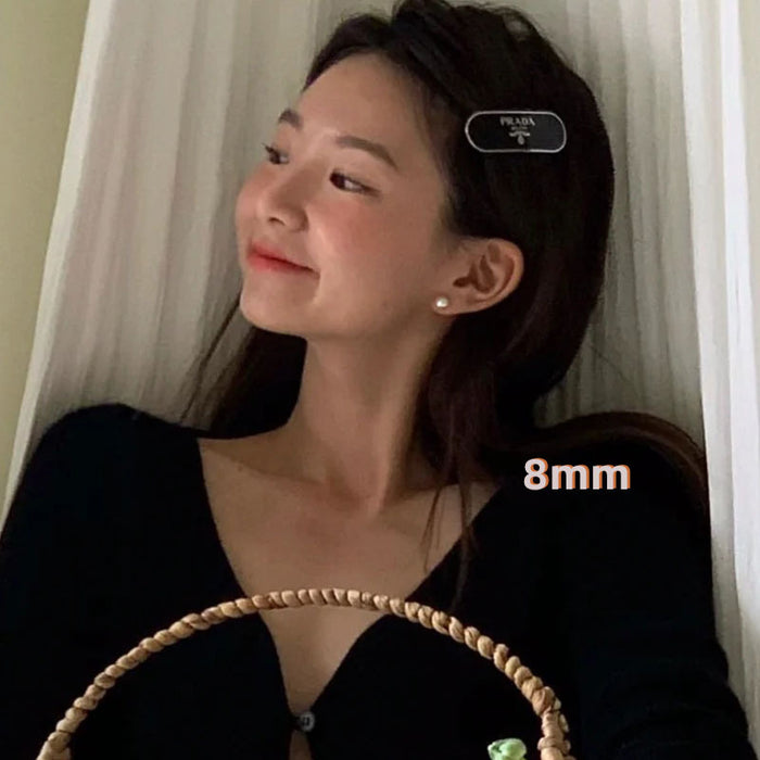 Wholesale Pearl earrings women's pure silver light luxury high-end French earrings decoration