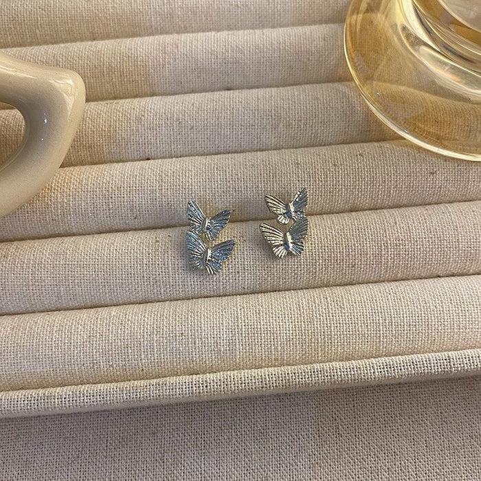 Wholesale Retro metallic butterfly earrings, high-end floral earrings, versatile, exaggerated, niche earrings