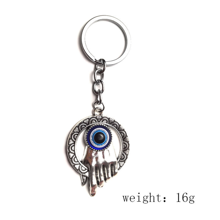 Wholesale Blue Eye Pendant Flower Butterfly Keychain Pendant Bag