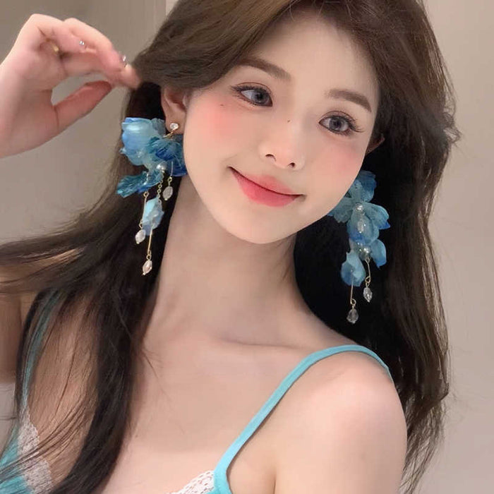 Wholesale High end exaggerated flower tassel earrings, niche vacation style petal earrings, atmosphere and temperament earrings