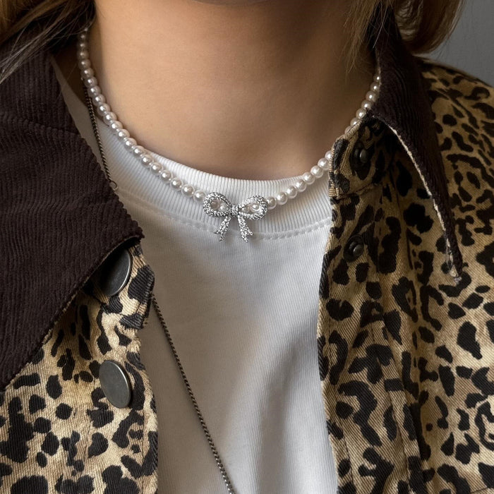 Wholesale Jewelry Fashion Pearl Necklace Versatile Diamond Set Bow Sweater Chain Versatile Pendant