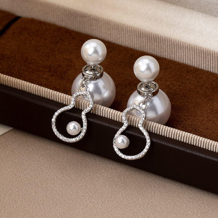 Wholesale Diamond-encrusted pearl earrings