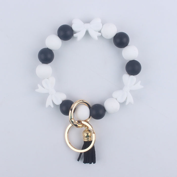 Wholesale Cartoon bow silicone bracelet keychain handmade beaded bracelet jewelry