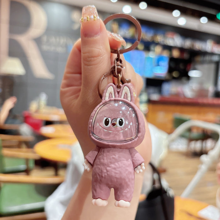 Wholesale Creative cartoon illuminated keychain figurine, car couple bag pendant, student backpack ornament