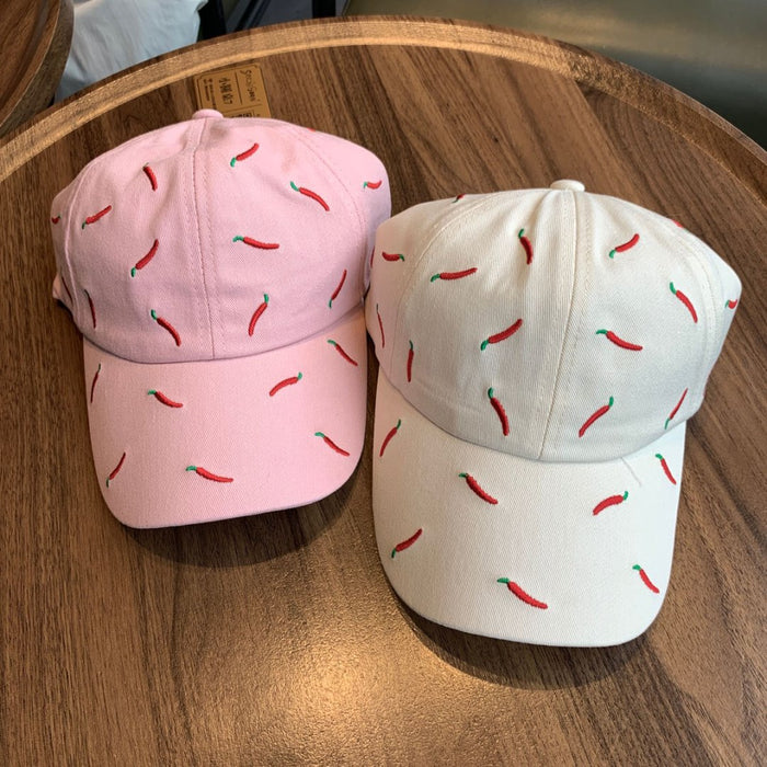 Wholesale Sweet girl style pink baseball cap with playful pepper pattern on the cap, fashionable and eye-catching, versatile style