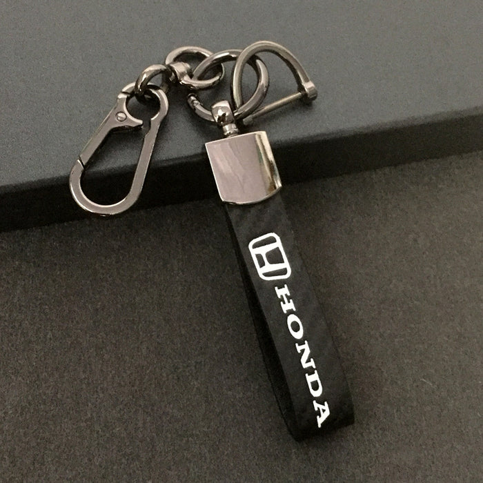 Wholesale Car keychain carbon fiber leather strap car keychain hanging rope