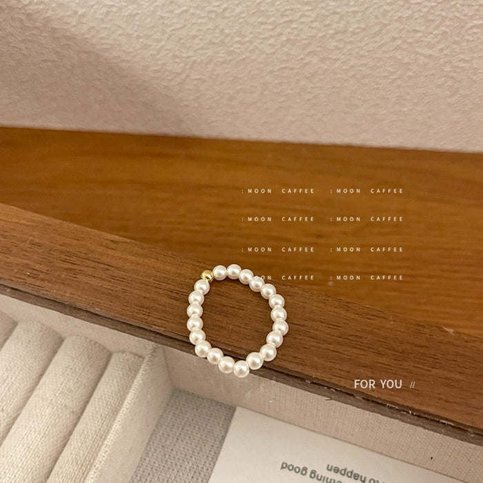 Wholesale Light luxury mini pearl bead elastic rope ring with a retro temperament that does not touch the wrist circumference, freshwater pearl ring