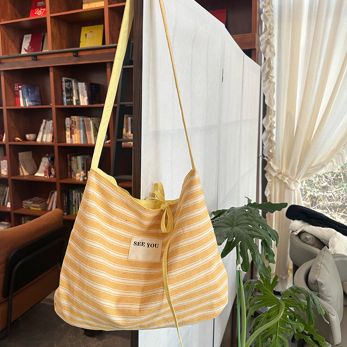 Wholesale Canvas striped large capacity fashionable simple versatile crossbody bag for work commuting tote bag