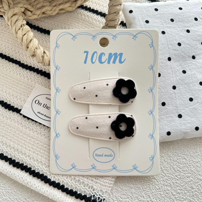 Wholesale Sweet bow hair clip with water droplets, wavy dots, children's fabric, side broken hair, wavy dots, bangs clip