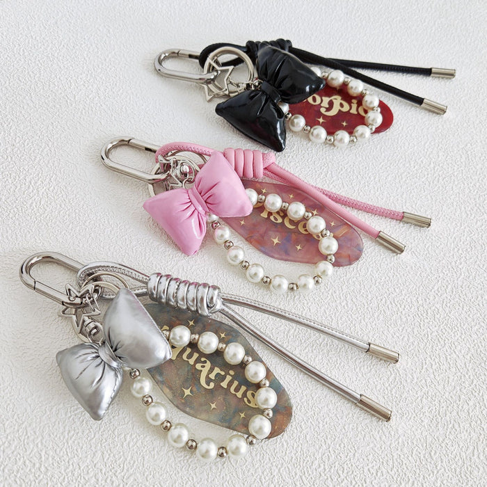 Wholesale Simple Bow Woven Leather Rope Pearl Chain Hanging Keychain