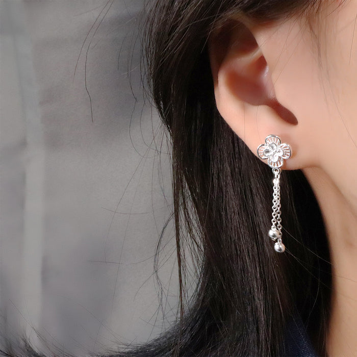 Wholesale Hollow flower tassel earrings, fashionable lucky clover earrings