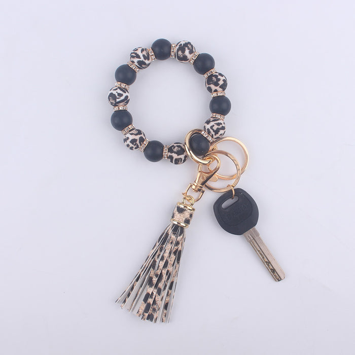 Wholesale Silicone bracelet wrist keychain tassel pendant