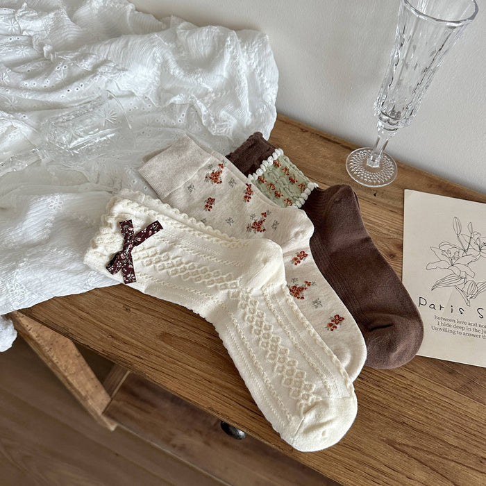 Wholesale Designer bow socks, children's mid tube socks, new niche original stacking socks