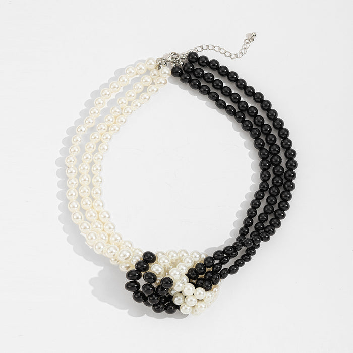 Wholesale Fashionable trend multi-layer imitation pearl necklace, artistic retro black and white color matching, high-end feeling pearl collar
