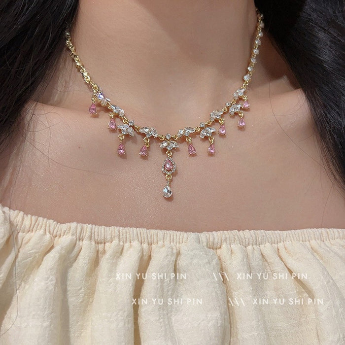 Wholesale Light luxury sparkling diamond water droplet fringe necklace, niche design, high-end temperament, versatile butterfly pendant, collarbone chain