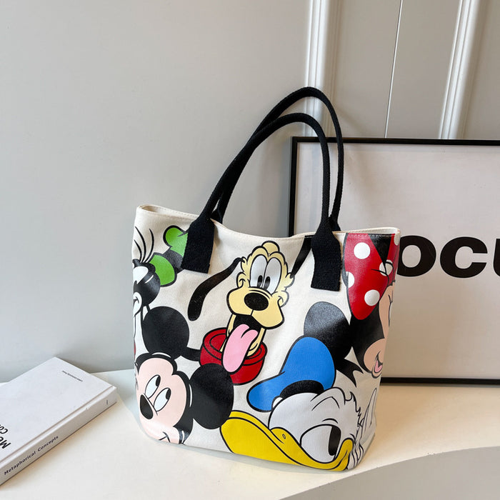 Wholesale Cartoon large capacity canvas shoulder bag, women's casual versatile tote bag, student class backpack, handbag