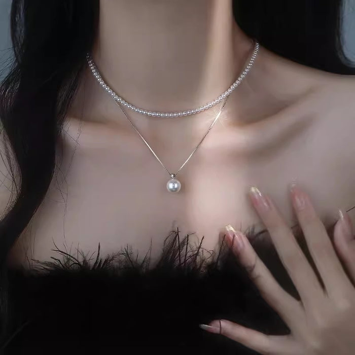 Wholesale Silver pearl pendant necklace, women's new style temperament, collarbone chain, high-end feeling, light luxury, niche necklace accessories