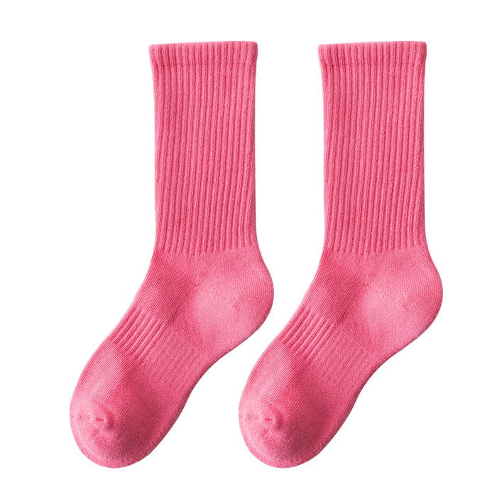Wholesale Solid color high elastic looped socks for men and women, long socks for sports, cotton socks