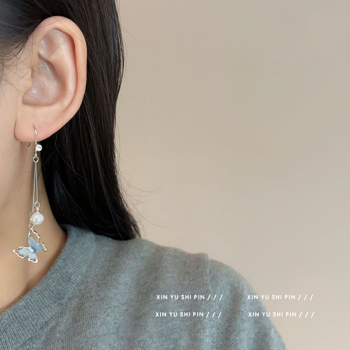 Wholesale Butterfly pearl tassel earrings with unique temperament, new earrings with distinctive features