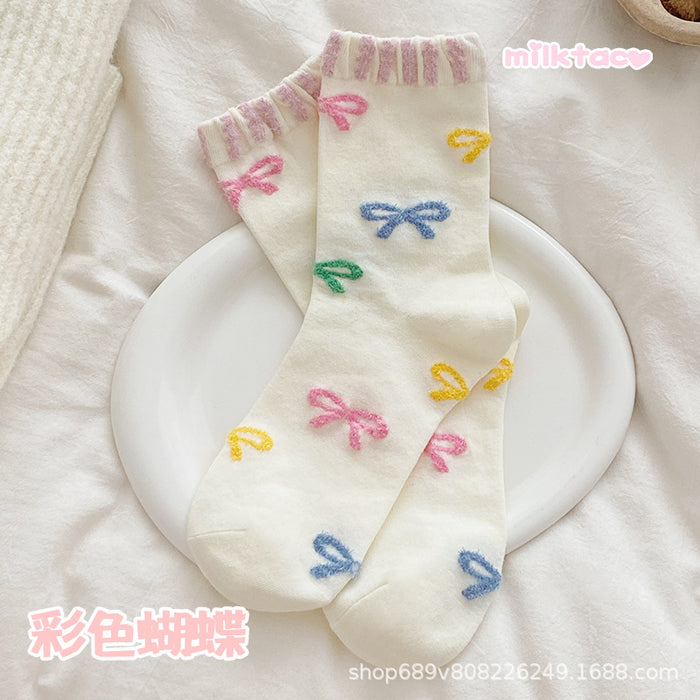 Wholesale Butterfly knot splicing plush socks with cartoon middle tube, cute for students