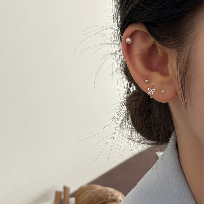 Wholesale Pure silver bow earrings with simple, compact, exquisite and niche design, high-end, natural and versatile new earrings