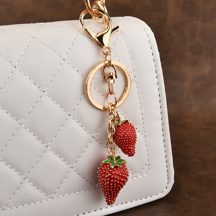 Wholesale strawberry fruit lady cute alloy keychain key bag pendant