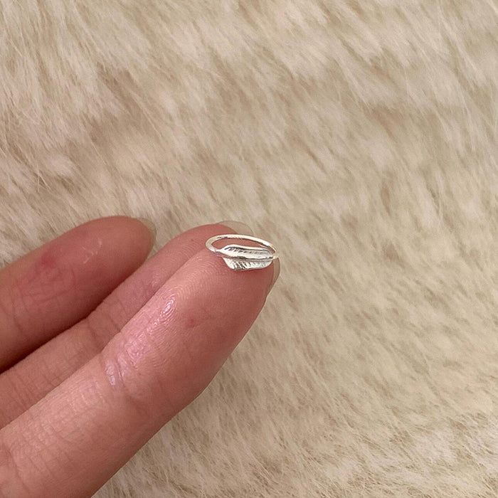 Wholesale Compact and minimalist leaf earrings with delicate and niche design, featuring metal leaf earrings