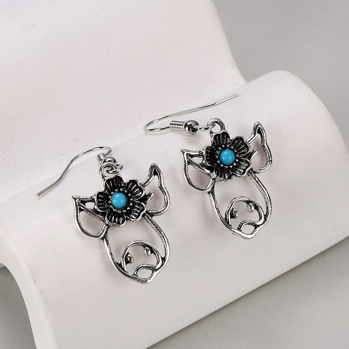 Wholesale Retro Bohemian Turquoise Hollow Earrings