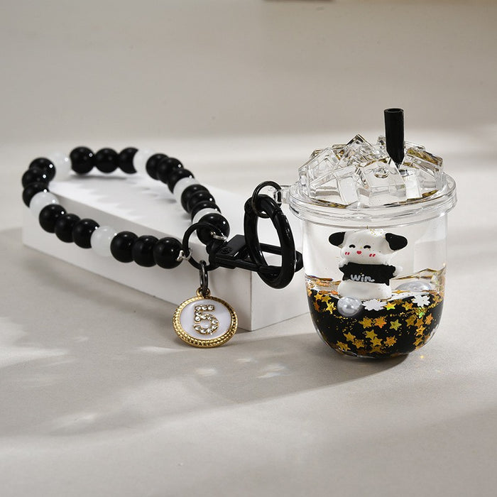 Wholesale Black and gold glitter bottle milk tea cup oil-filled acrylic keychain