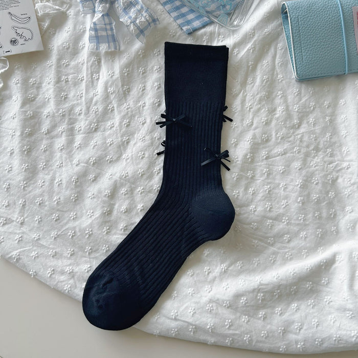 Wholesale Bow tie socks, long tube pile socks