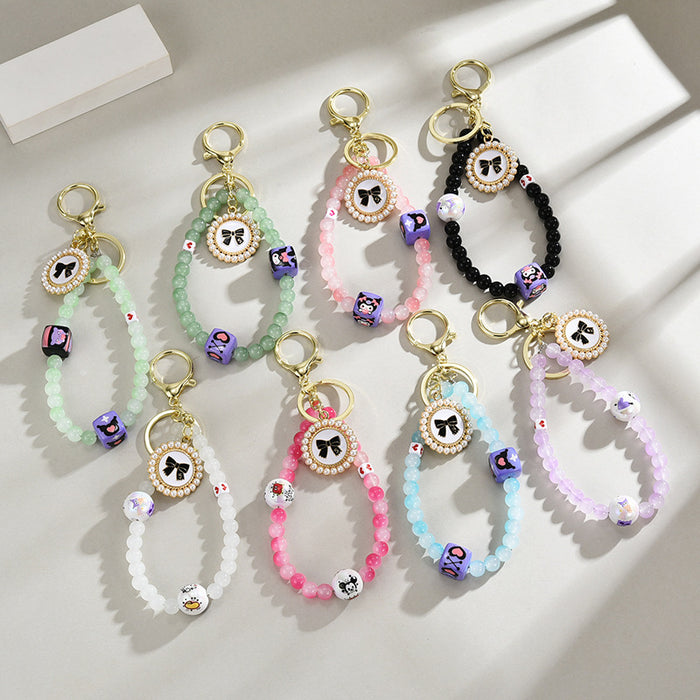 Wholesale Glass bead round brand bow keychain