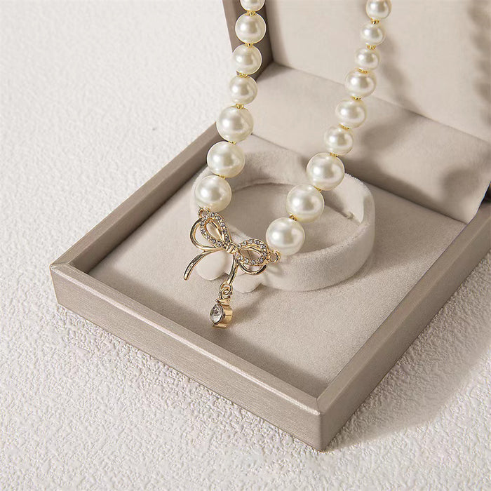 Wholesale  Double C Pearl Bow Female Shell Pearl Necklace-JDC-NE-Dingy007