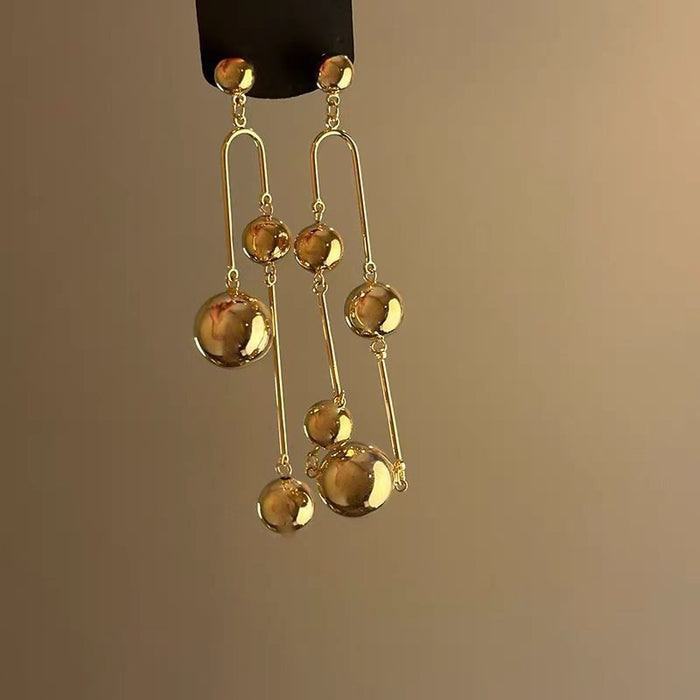 Wholesale Vintage metallic floral tassel earrings with a light luxury and high-end feel, niche design temperament, versatile and long earrings