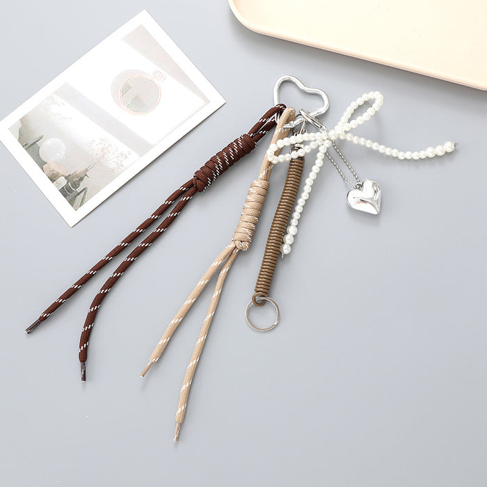 Wholesale Leather bow heart pendant luggage keychain lanyard accessories single buckle tassel pendant accessories