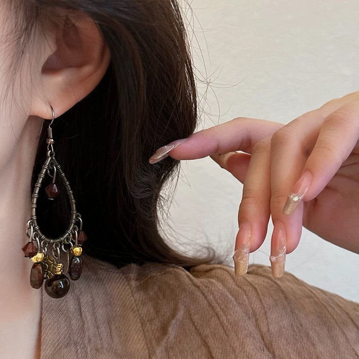 Wholesale Beaded tassel earrings, retro hollow water droplet earrings, long ear accessories