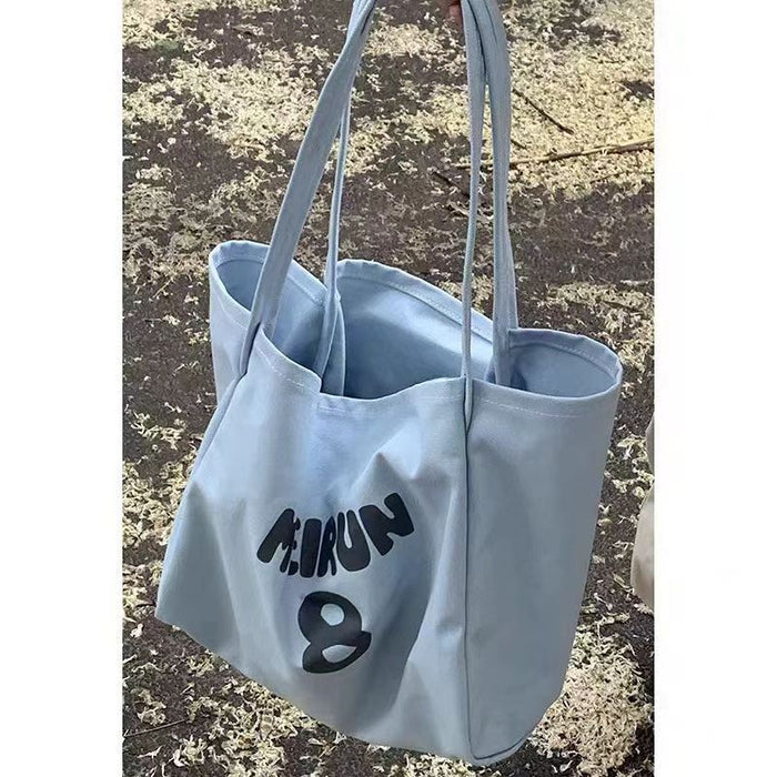 Wholesale Canvas bag commuting shoulder bag versatile tote bag large capacity outdoor tote bag