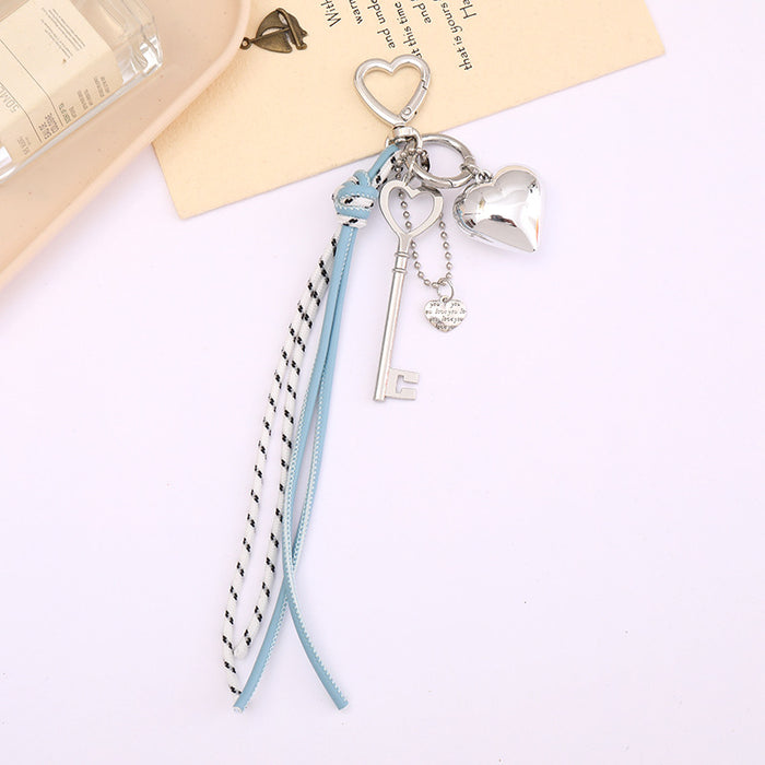 Wholesale Leather bow heart pendant luggage keychain lanyard accessories single buckle tassel pendant accessories
