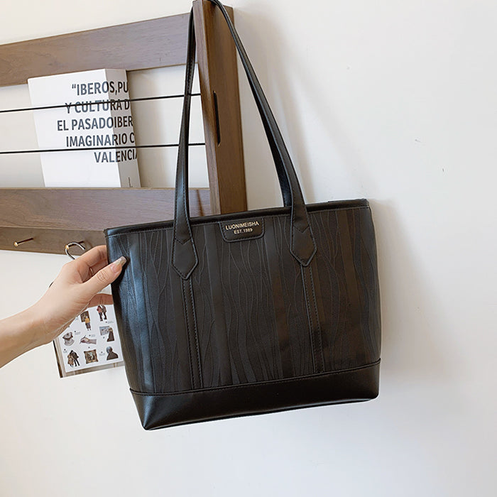 Wholesale Ladies' personalized bucket bag, large capacity commuting bag, single shoulder armpit bag