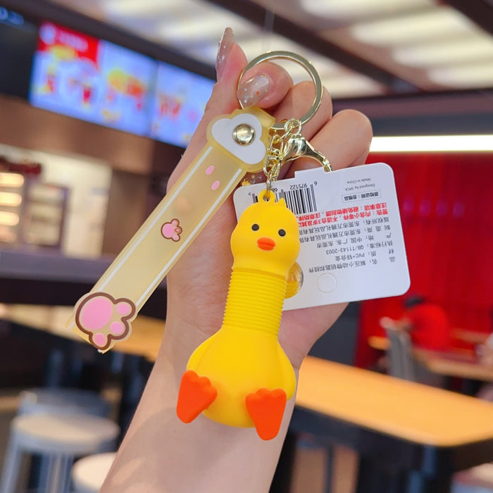 Wholesale Retractable animal pendant PVC doll keychain