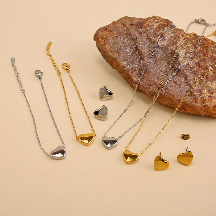 Wholesale Fashion classic stainless steel heart necklace bracelet earrings three piece set wholesale solid pendant