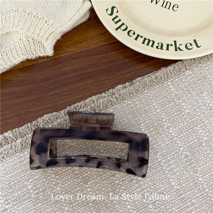 Wholesale Leopard print cross bow geometric hair clip, fashionable grip clip, versatile hair accessory