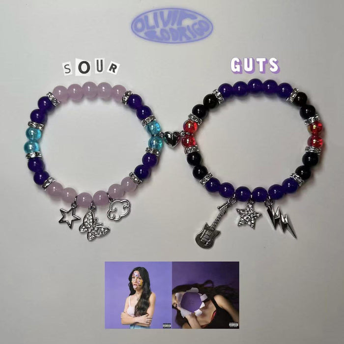 Wholesale bat guitar love butterfly IP love magnetic attraction men and women couples bracelet elastic bracelet