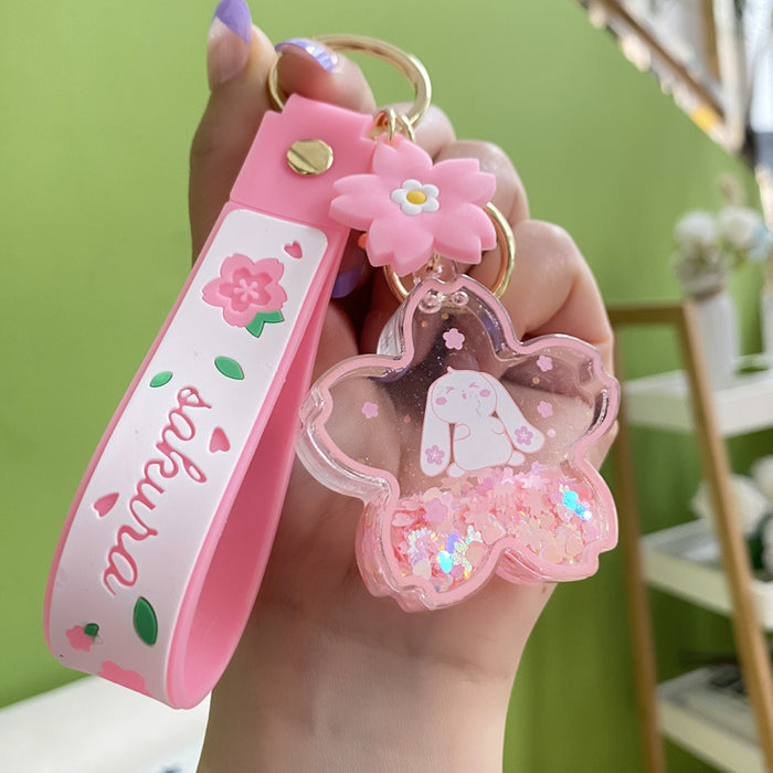 Wholesale sequins into oil snowflake keychain creative liquid chain girls exquisite pendant