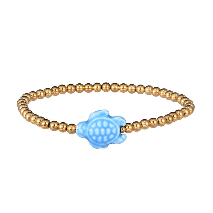 Wholesale Swimming wearable mini bracelet accessory ceramic conch animal turtle titanium steel non fading bracelet