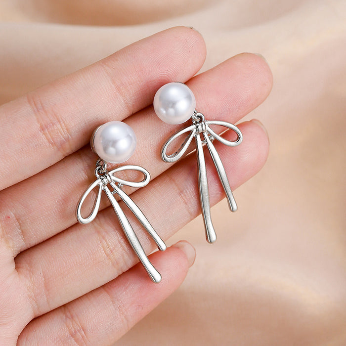 Wholesale Pearl earrings, light luxury, simple bow design, niche design, high-end accessories wholesale