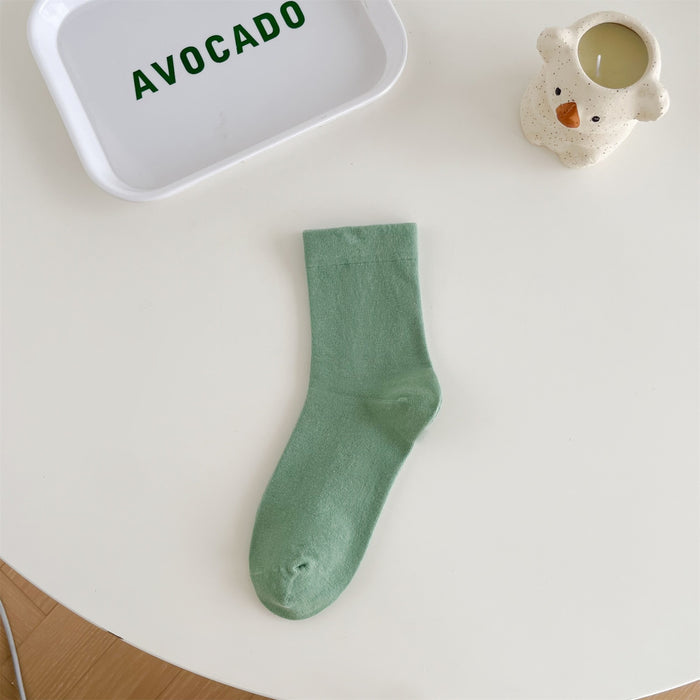 Wholesale Middle school women's solid color simple pile socks made of pure cotton