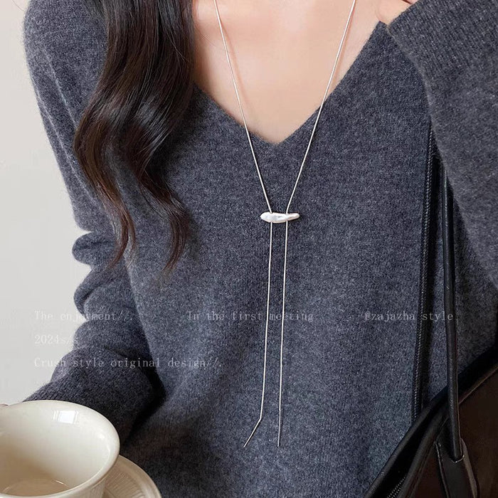Wholesale Minimalist silver heart pendant necklace, women's light luxury high-end feel, long sweater chain accessory