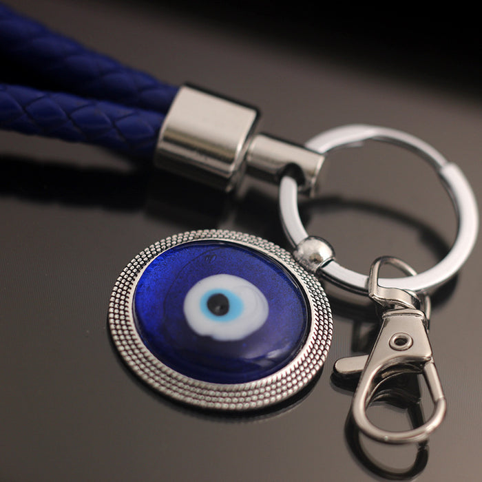 Wholesale Blue eyed blank metal keychain and chain gift keychain, fashionable and versatile